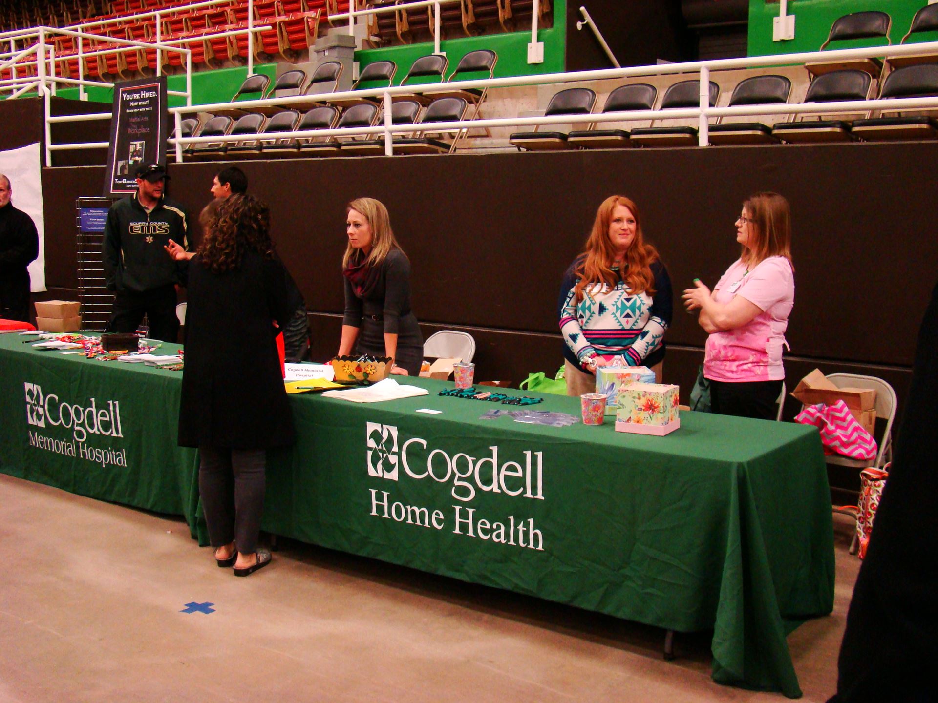 Individuals at Cogdell booth.